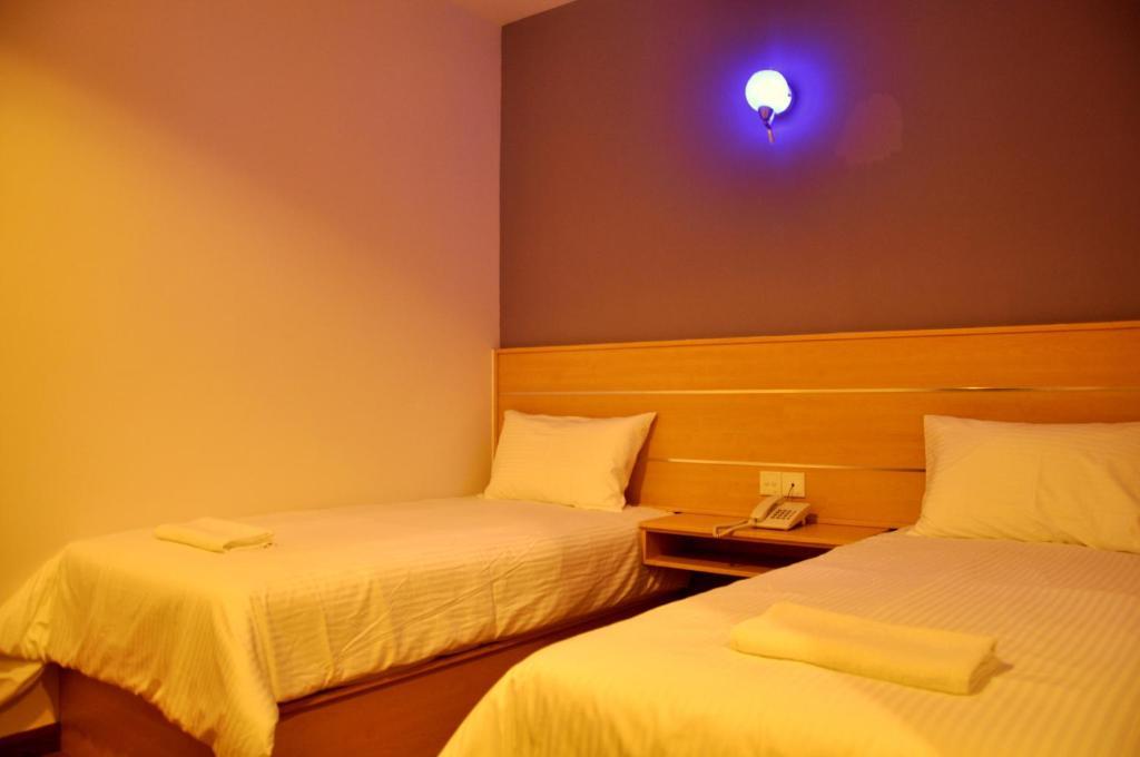 Hotel Economy Kapar Стая снимка